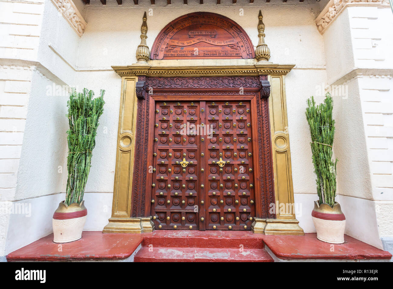 Carved wooden doors of stone town Stock Photo - Alamy