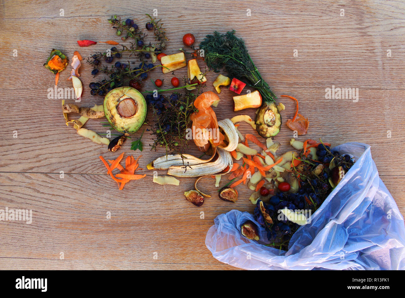 Domestic waste for compost from fruits and vegetables in the garbage bag on the table Stock