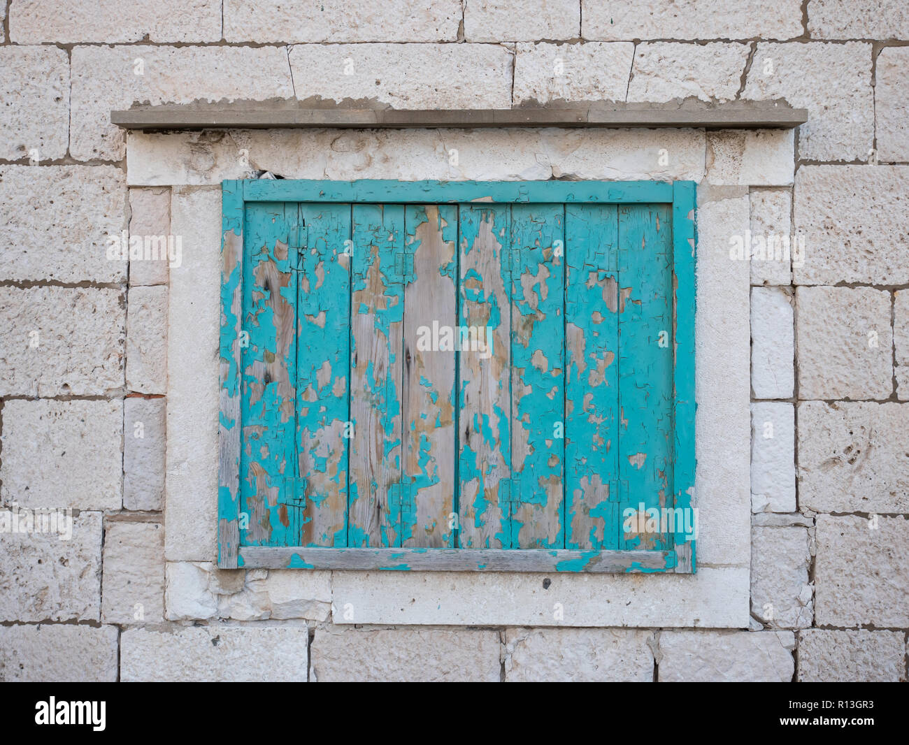 Old wooden window on stone house facade Stock Photo - Alamy