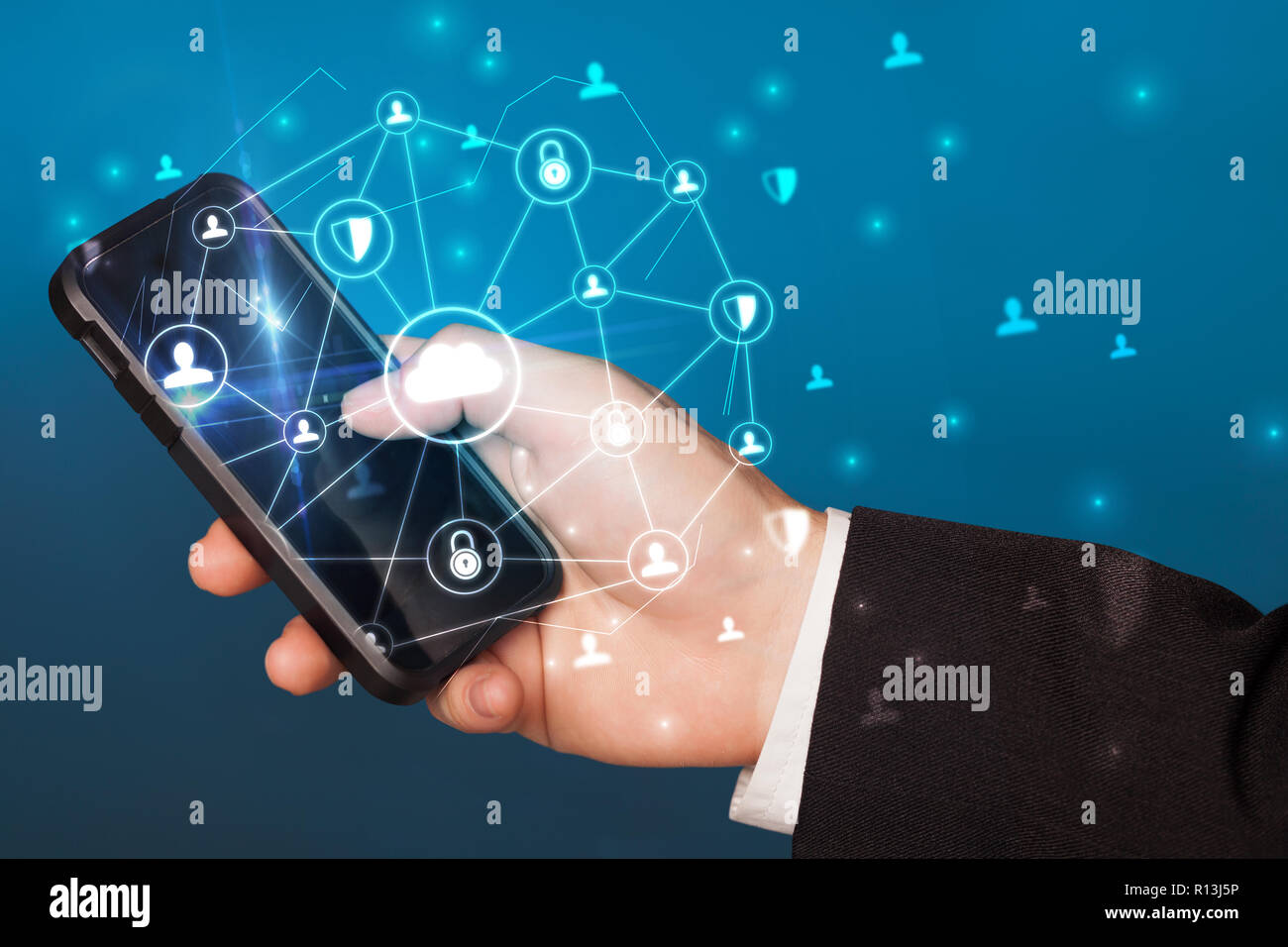 Hand using phone with centralized cloud computing system and network ...