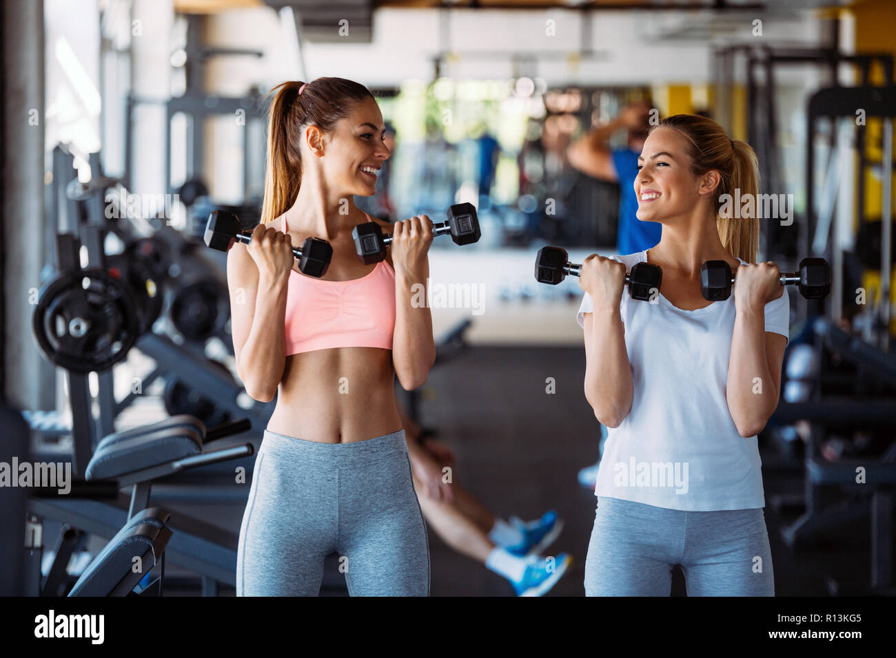 Beautiful women working out in gym Stock Photo - Alamy