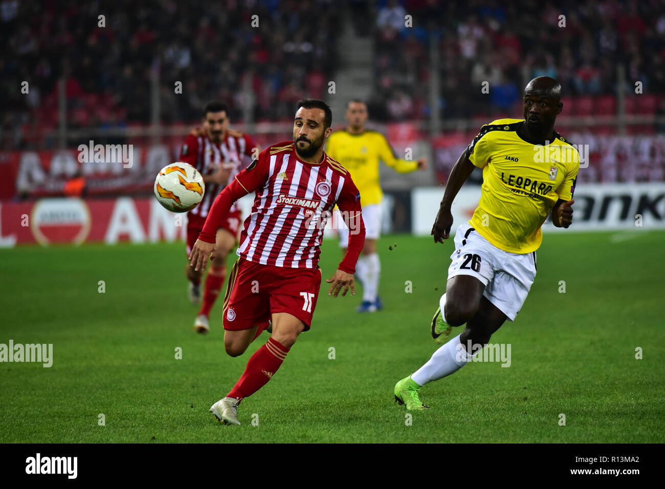 Athens, Greece. 08th Nov, 2018. Giannis Fetfatzidis (no 10) of Olympiacos  and Jerry Prempeh (no 26) of F91 Dudelange vies for the ball. Olympiacos  has won F91 Dudelange 5-1 for the UEFA