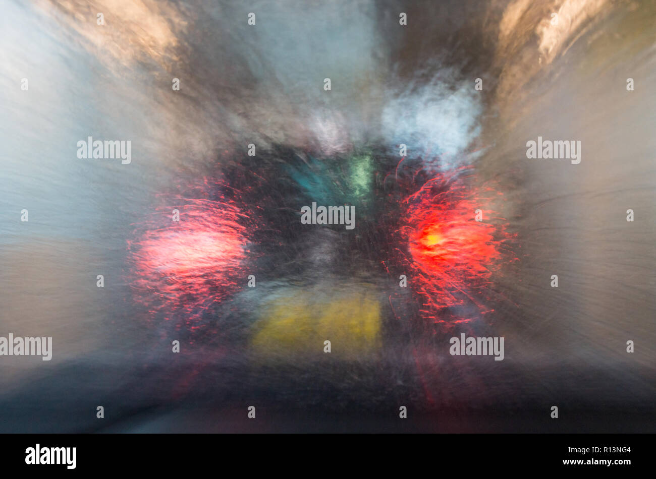 inside of car wash looking through windscreen and at car in front