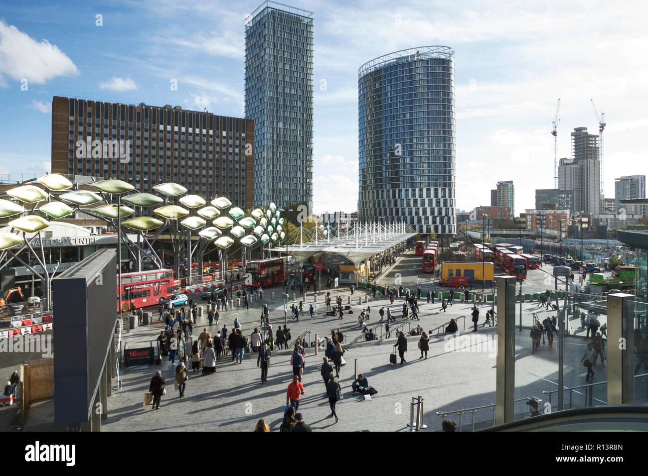 Stratford London transport infrastructure - London Stratford bus station, and the Shoal Artwork, and Stratford Shopping Centre (on the left). Stock Photo