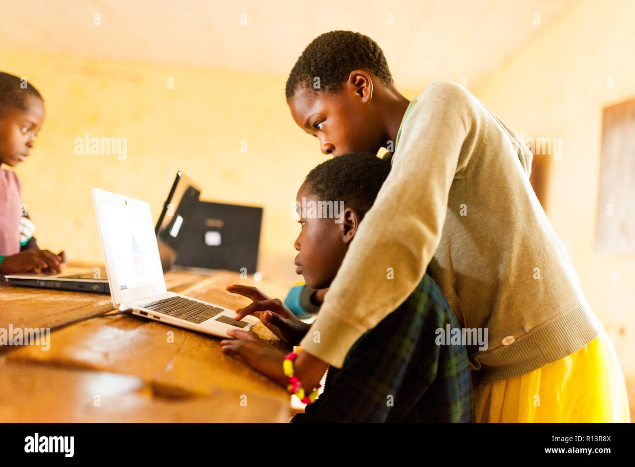 Bafoussam, Cameroon - 06 august 2018: beautiful image of african school children learning to use computer in classroom of african school Stock Photo