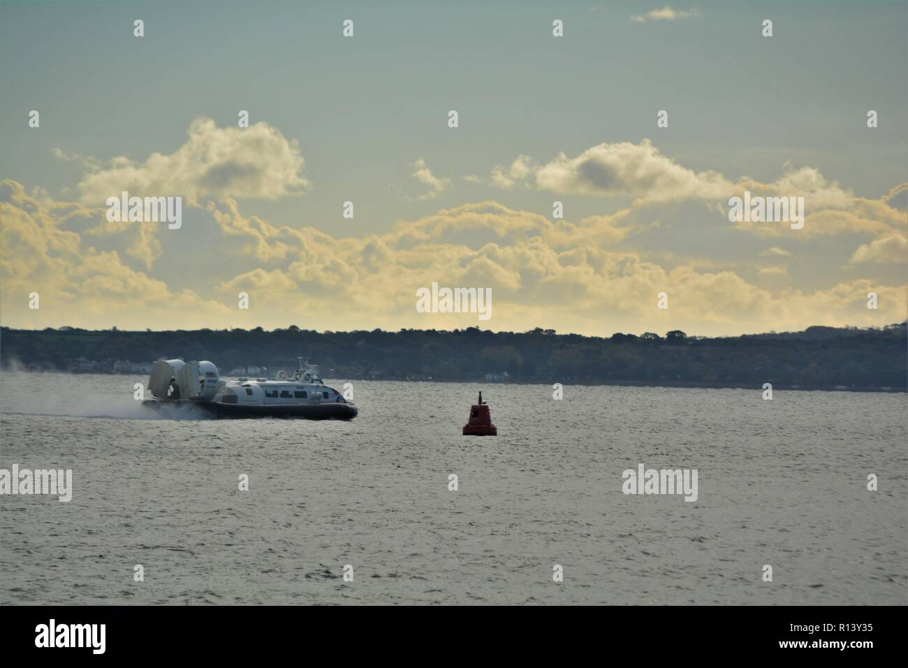 Portsmouth To Isle Of Wight Hovercraft Crossing The Solent Stock Photo portsmouth-to-isle-of-wight-hovercraft-crossing-the-solent-stock-photo