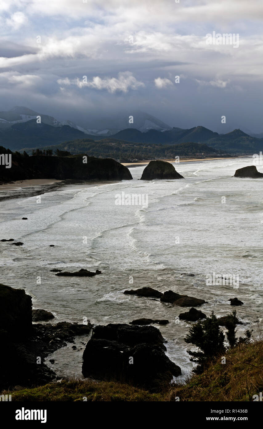 OR02367-00...OREGON - Sunrise on a stormy winter morning on the Oregon Coast at Ecola Point on Ecola State Park near Cannon Beach. Stock Photo