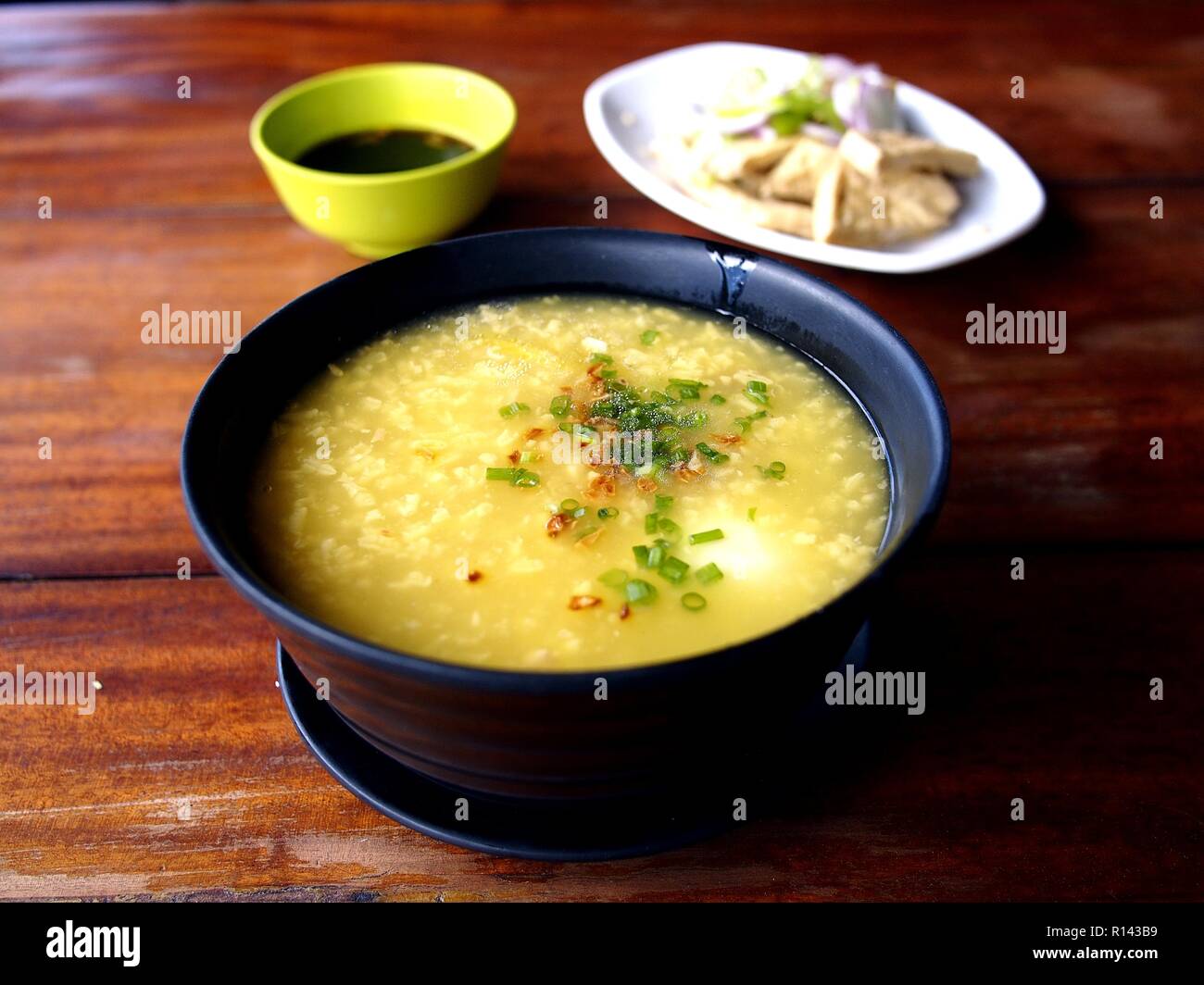 Photo of a bowl of porridge or congee or known in the Philippines as lugaw or goto Stock Photo