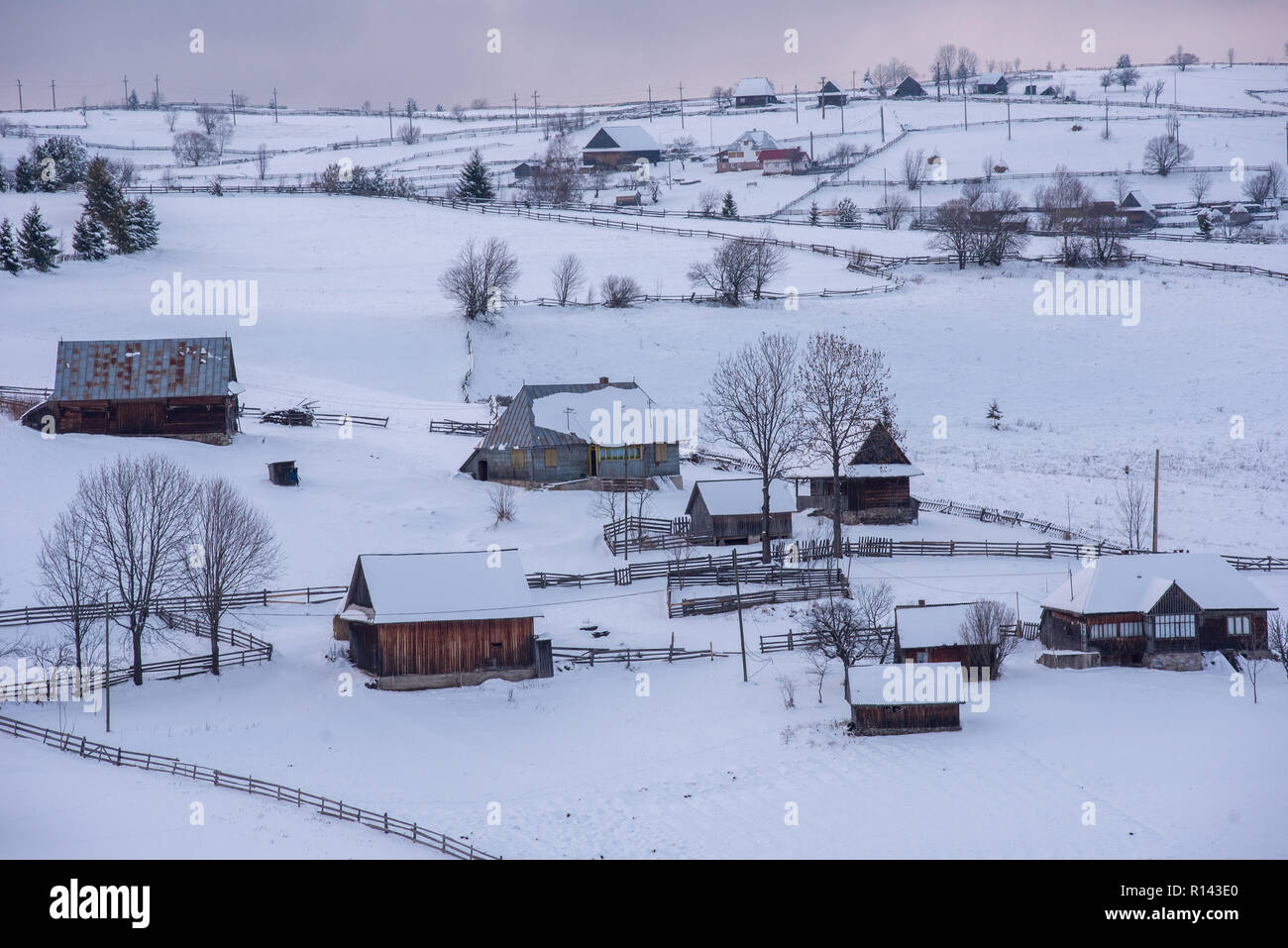 Winter mountain village landscape with snow covered houses Stock Photo ...