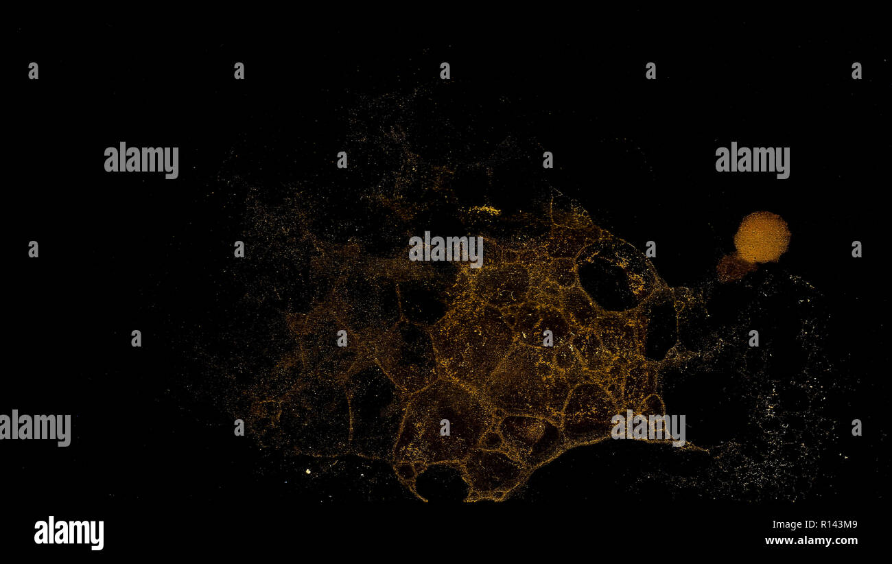 Abstract grunge cellular background against black Stock Photo