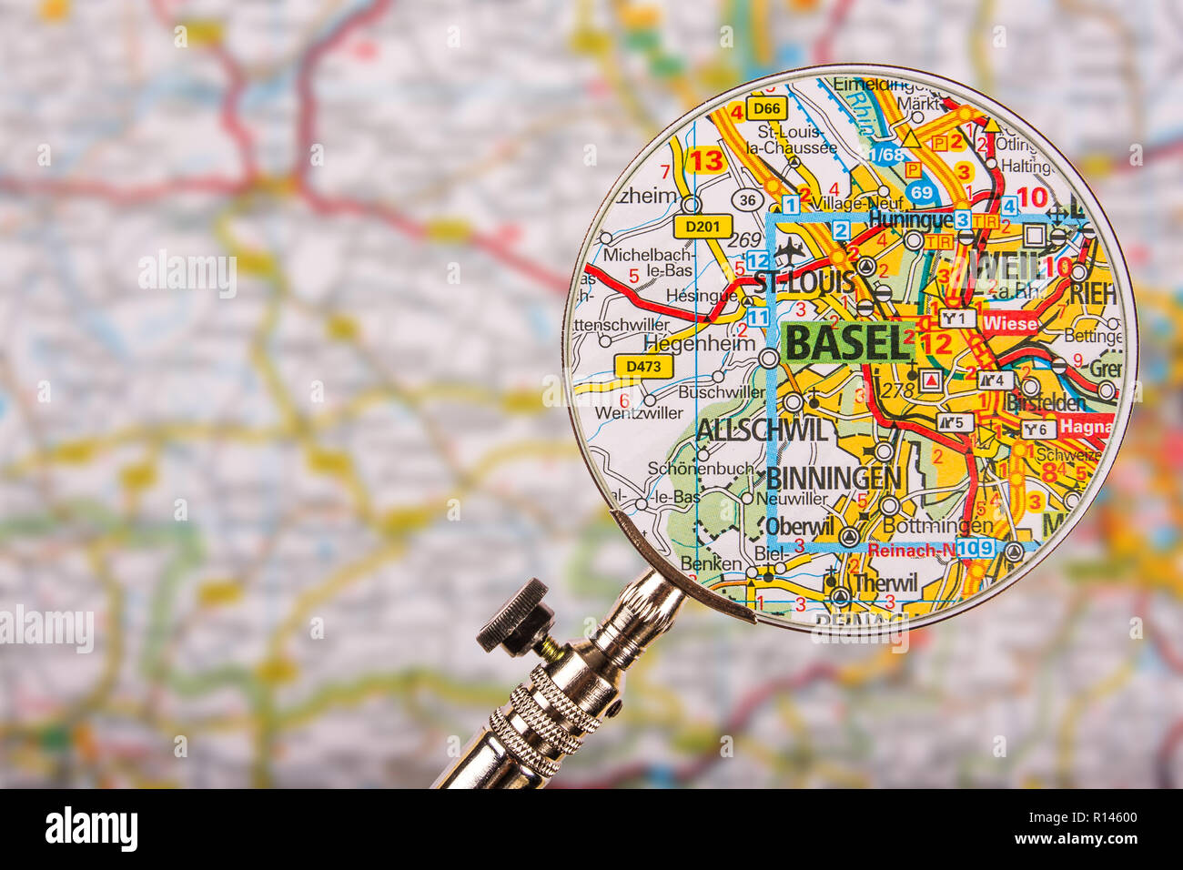 Map of Basel with magnifying glass on table Stock Photo