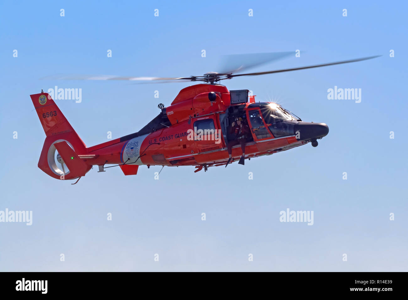 Helicopter Coast Guard Dolphin aircraft performing search and rescue Stock Photo