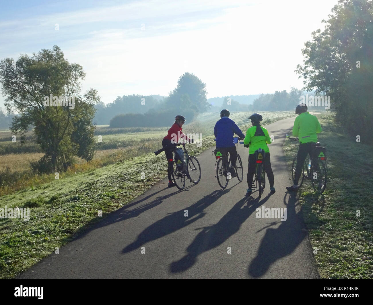 Early morning bikers in Belgium. Stock Photo