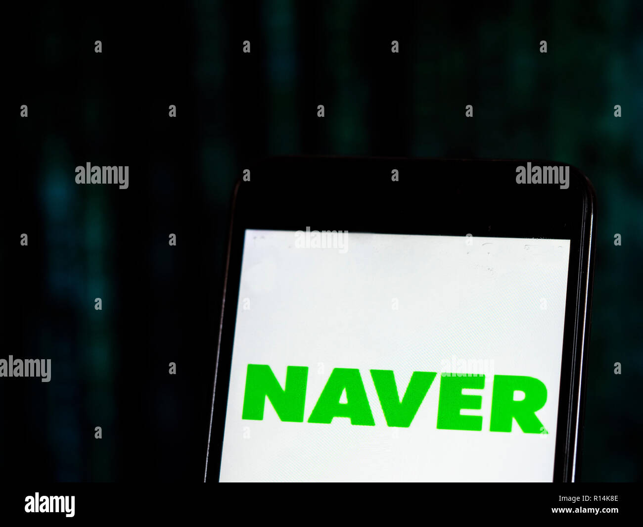 Naver Internet company logo seen displayed on smart phone. Naver Corporation is an Internet content service company headquartered in Seongnam, South Korea that operates the Korean search engine Naver. Naver established itself as an early pioneer in the use of user-generated content through the creation of the online Q&A platform Knowledge iN. Stock Photo