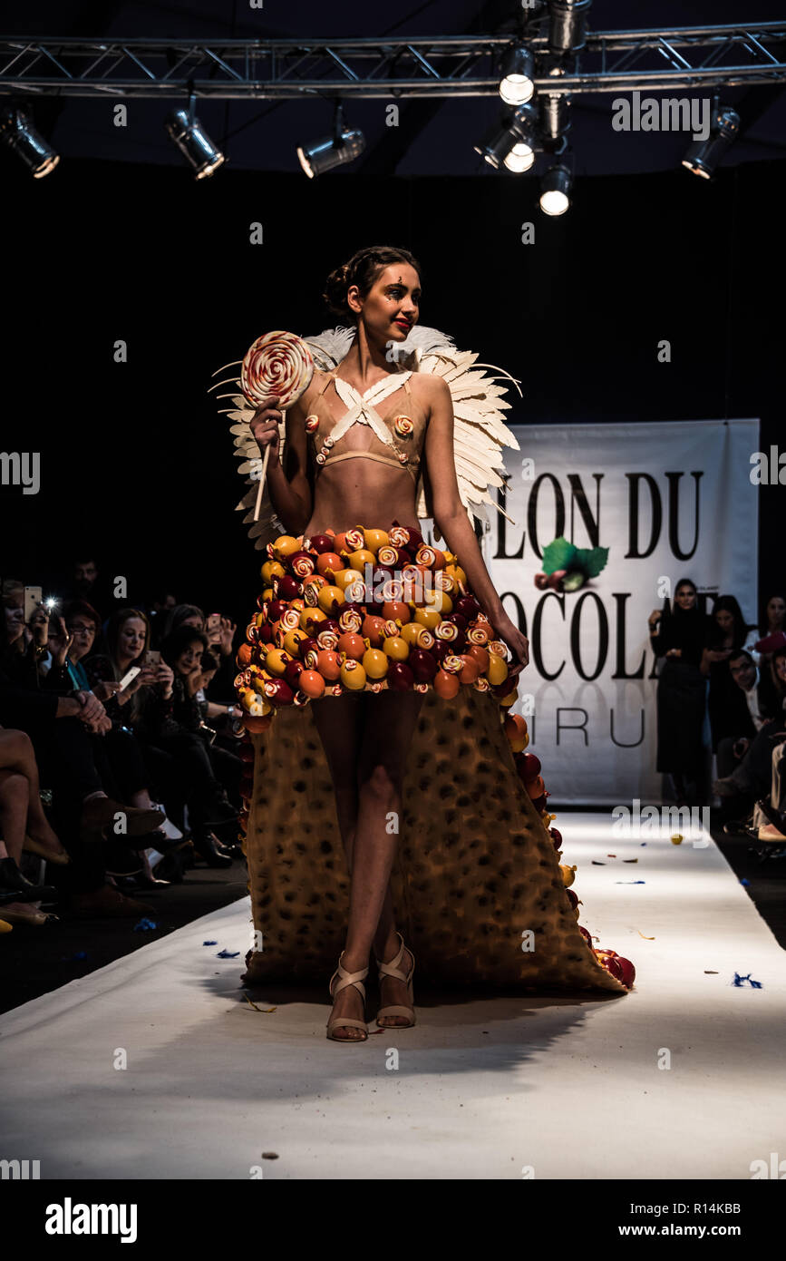dress made on runway A model wearing a dress made from chocolate seen walking on the runway at  the Salon du Chocolat. These carefully designed garments have been  painstaking put together by top Chocolatiers working with