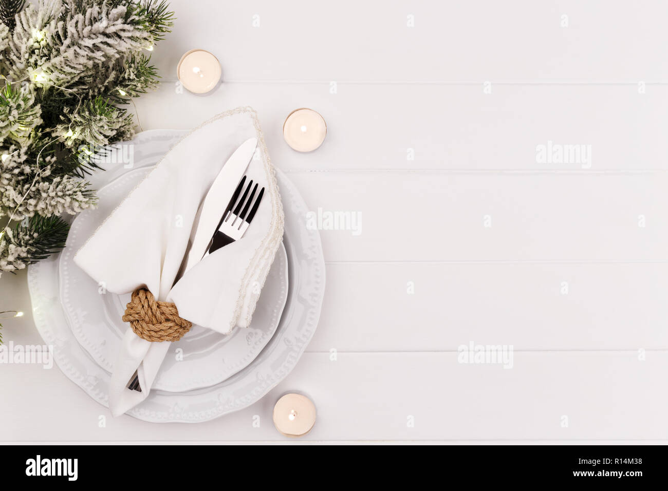 Christmas or new year table setting on white wooden table card or menu ...