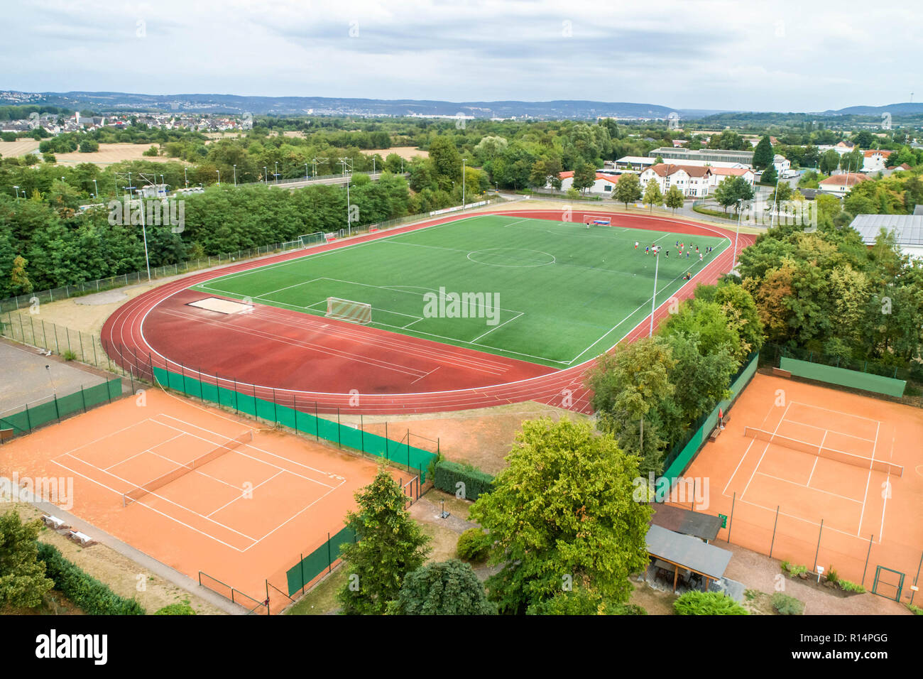 Aerial view of a smal sports soccer football field in village near andernach koblenz neuwied in Germany Stock Photo