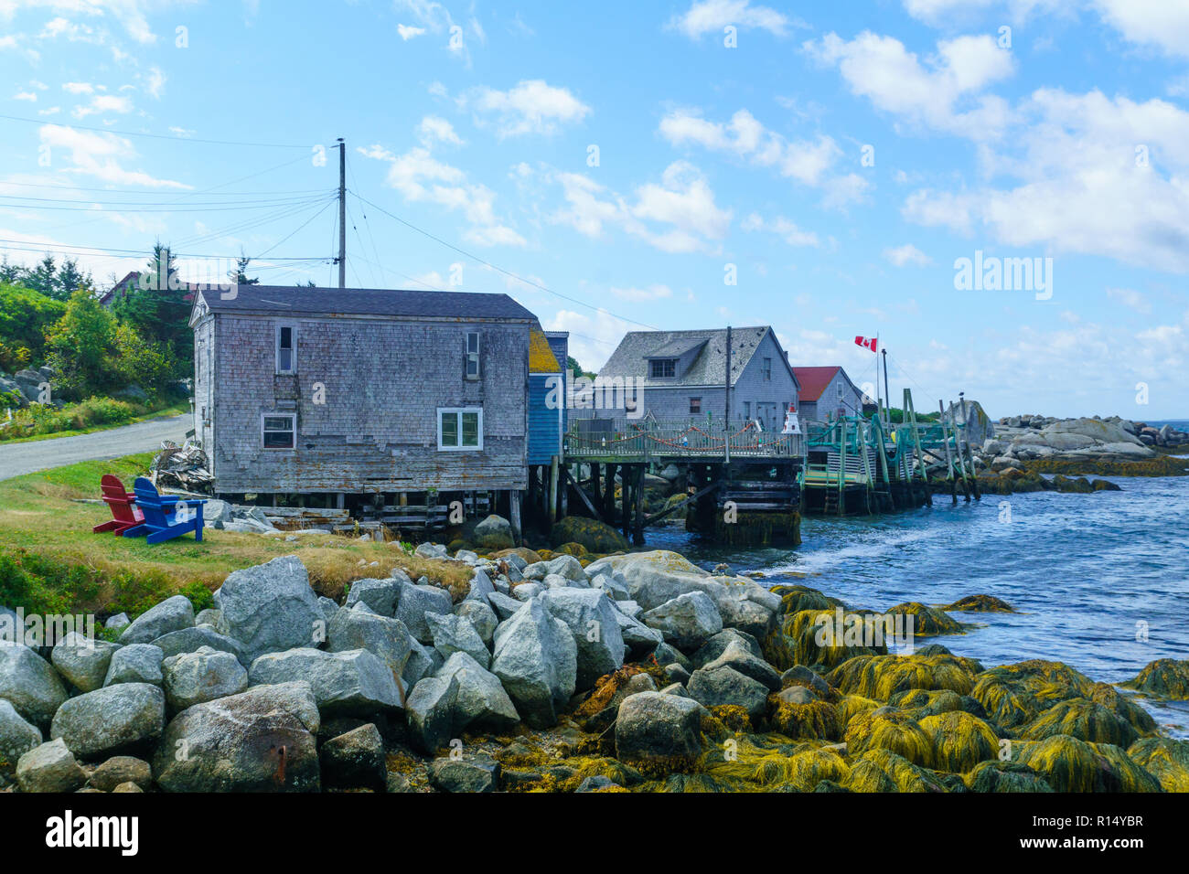 View of rocky shore and waterfront houses in the fishing village Indian