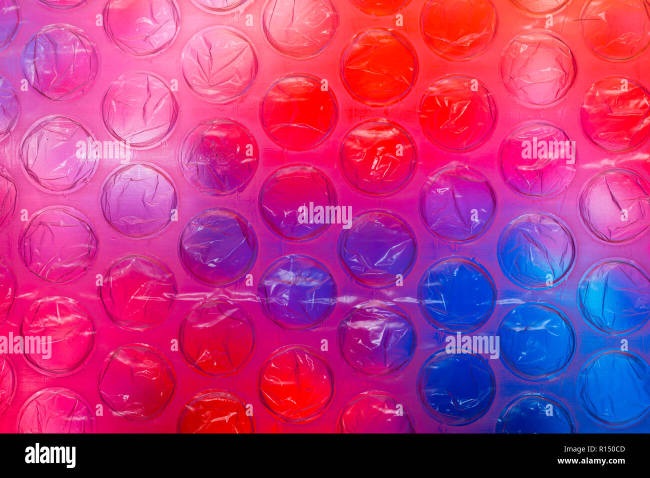 Abstract close up bubble wrap sheet with colourful background Stock Photo