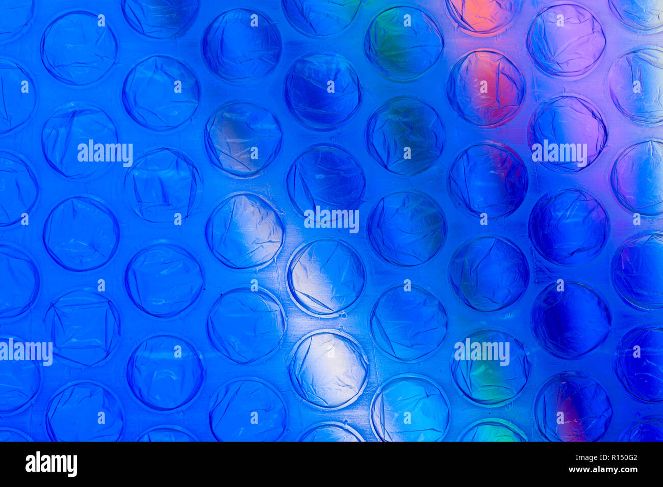 Abstract close up bubble wrap sheet with colourful background Stock Photo