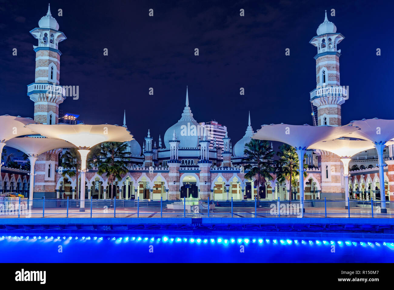 KUALA LUMPUR, MALAYSIA - JULY 22: Masjid Jamek mosqe at night, an historic traditional mosque on July 22, 2018 in Kuala Lumpur Stock Photo