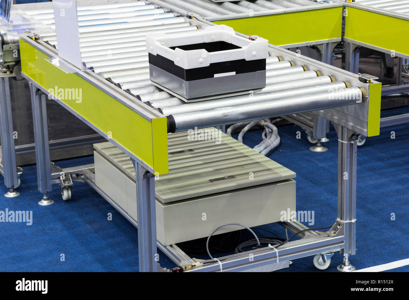 Conveyor Roller with pallet ; warehouse system Stock Photo Alamy