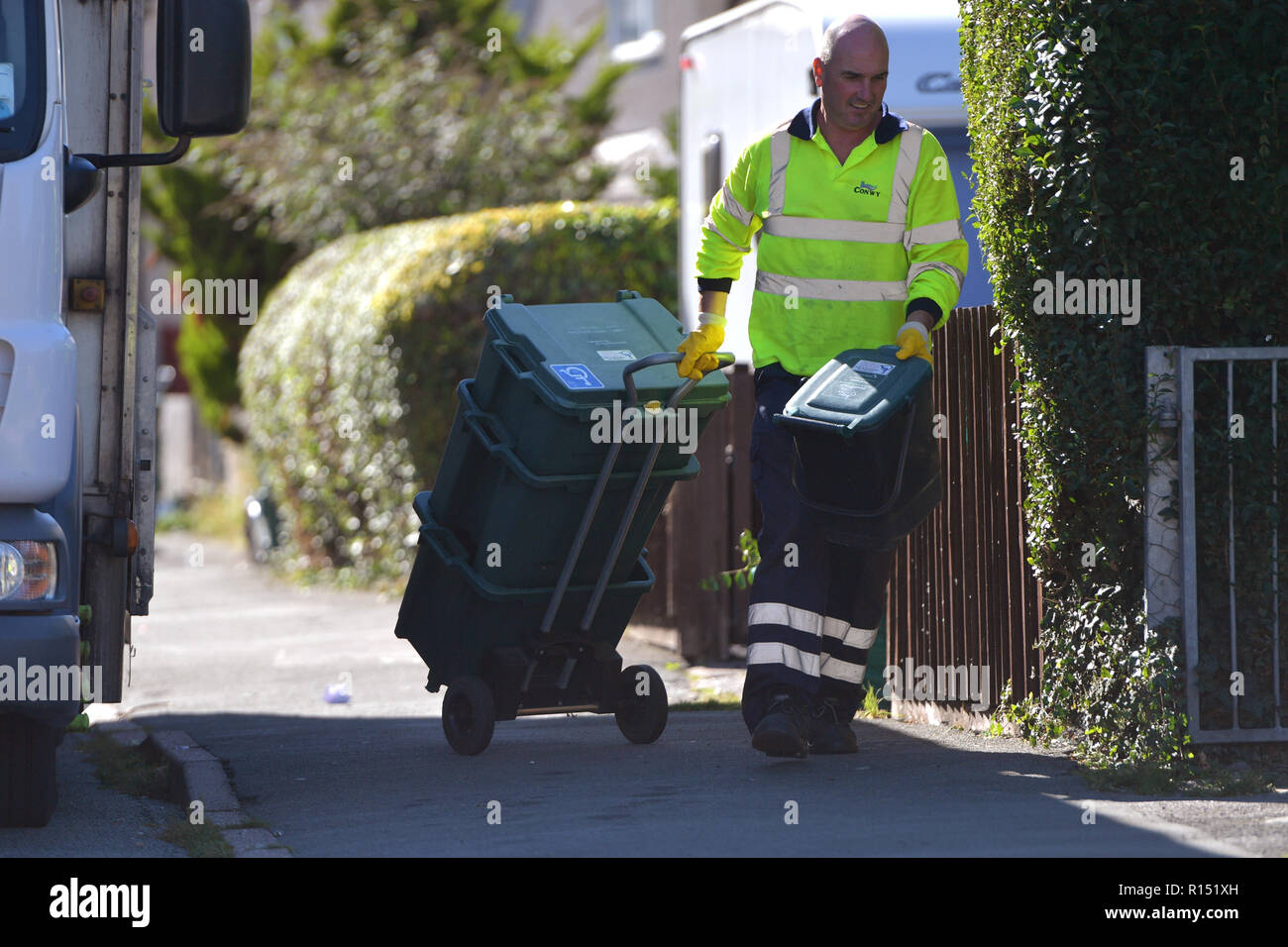 A recycling van from Conwy Borough Council collects recyclable waste on