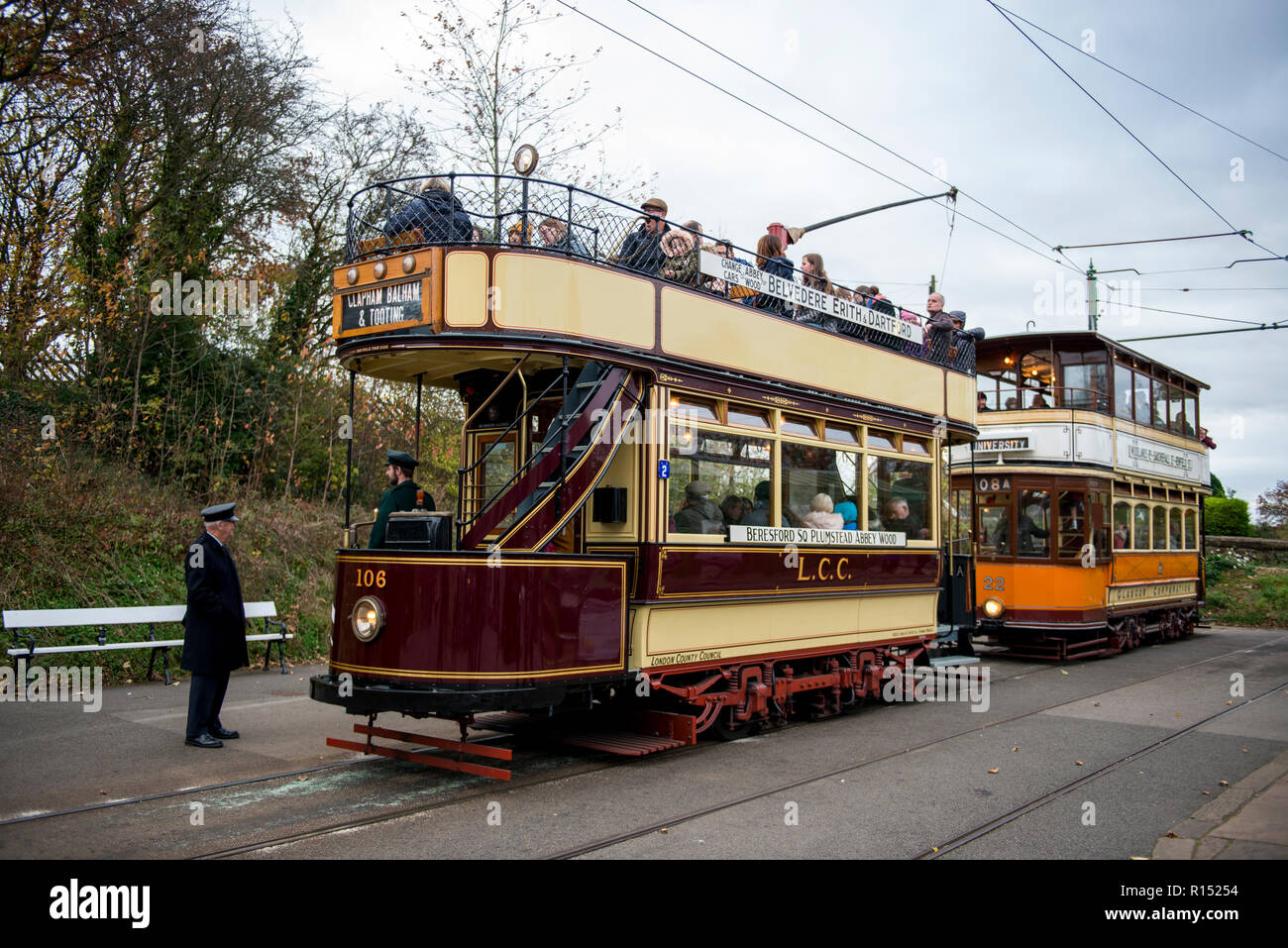 Vintage LCC South East London and Glasgow Trams on route at Crich Tramway Village, Derbyshire, UK Stock Photo