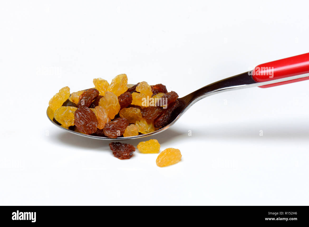 Sultaninen, Rosinen in Loeffel Stock Photo