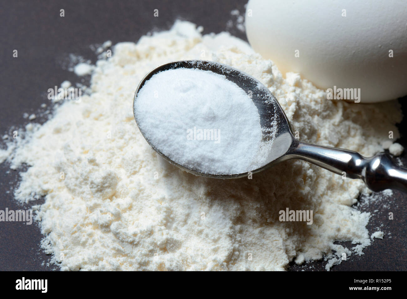 baking soda with flour and egg Stock Photo Alamy
