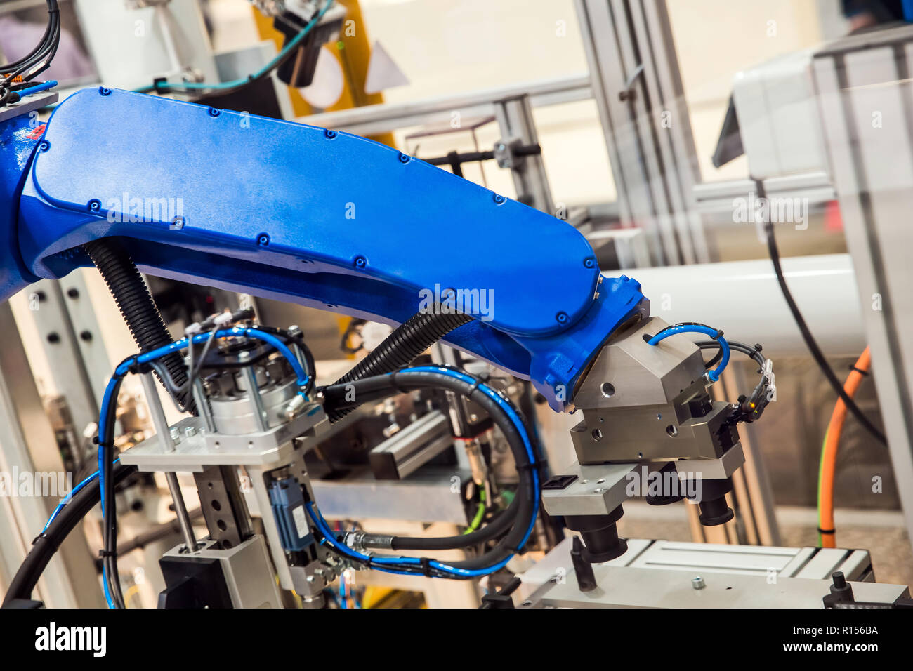 Robot arm in technology process Stock Photo