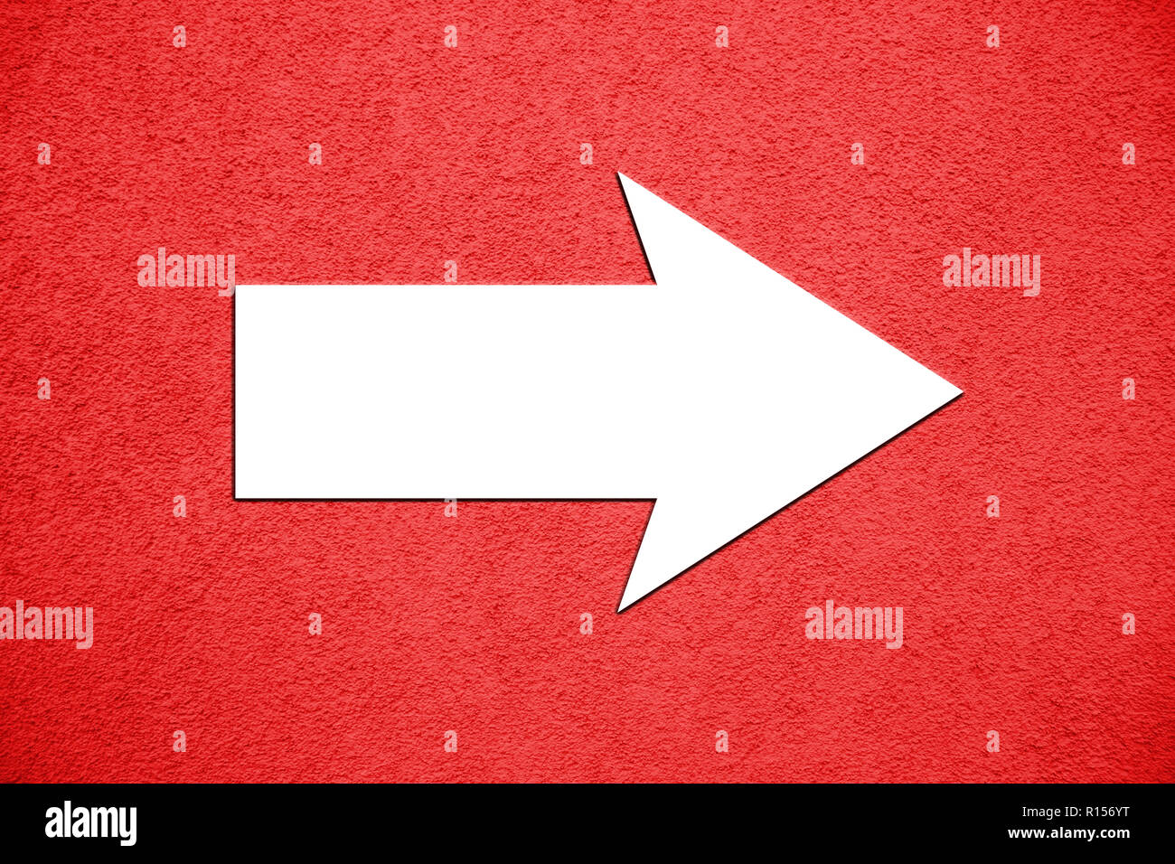 White arrow direction sign with large empty space for text over vivid ...
