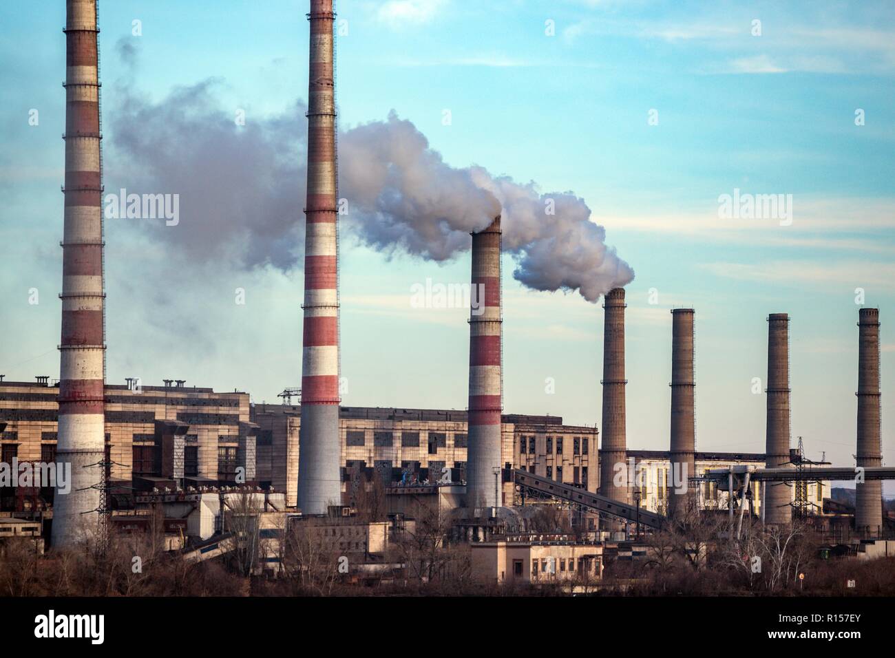 smoke from the trumpet. ecological catastrophy. Stock Photo
