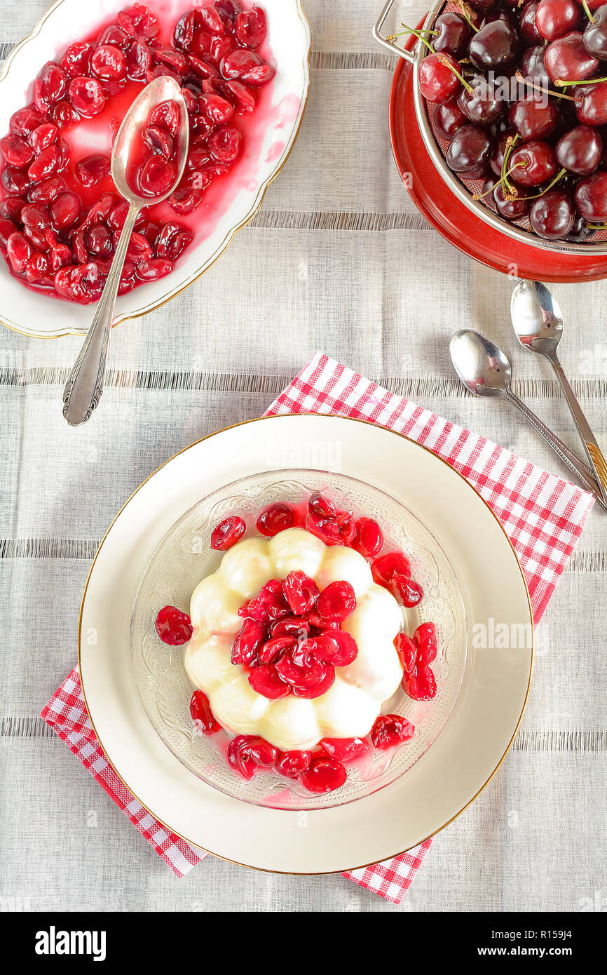 Pudding Compote Vanilla pudding with freshly cooked cherry compote Stock Photo - Alamy