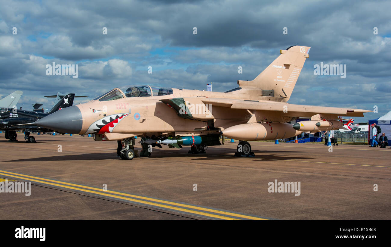 A Royal Air Force Tornado GR4 bomber in desert camouflage and with sharks teeth artwork for the static line up at RIAT, RAF Fairford, UK on 14/7/17. Stock Photo