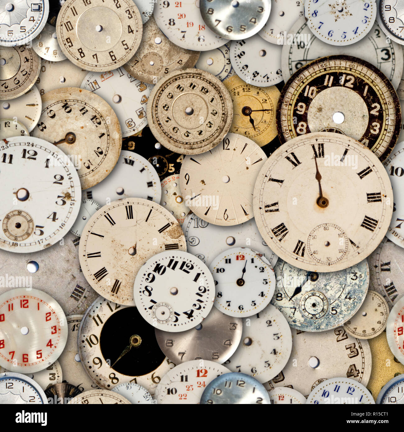 Antique watch faces steam punk repeating tileable wallpaper background.  Image repeats up, down, left and right Stock Photo - Alamy