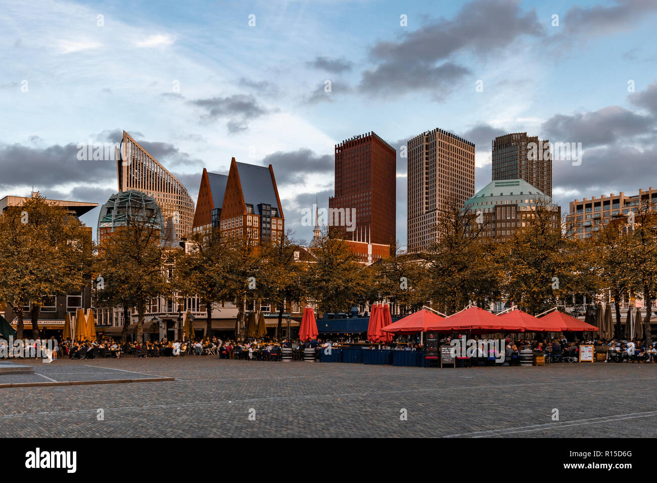 THE HAGUE, 12 October 2018 - City center, Spui place with restaurants and their terraces filled with people getting dink or dinner at the autumnal sun Stock Photo