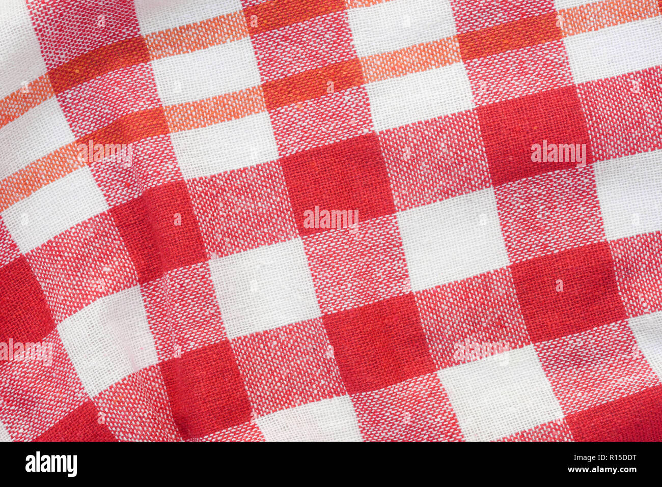 red and white checkered creased kitchen towel background texture Stock