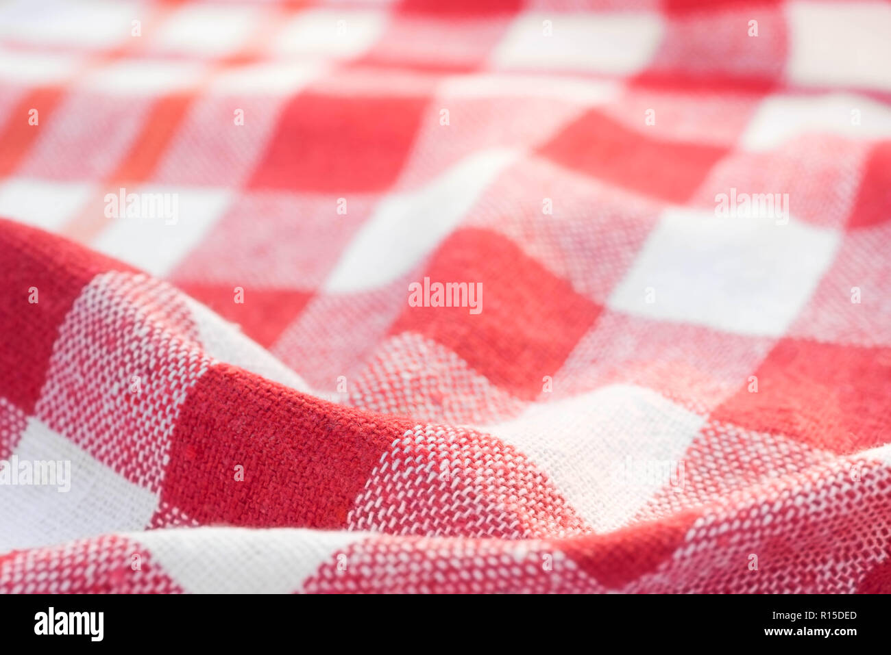 red and white checkered creased kitchen towel background texture Stock
