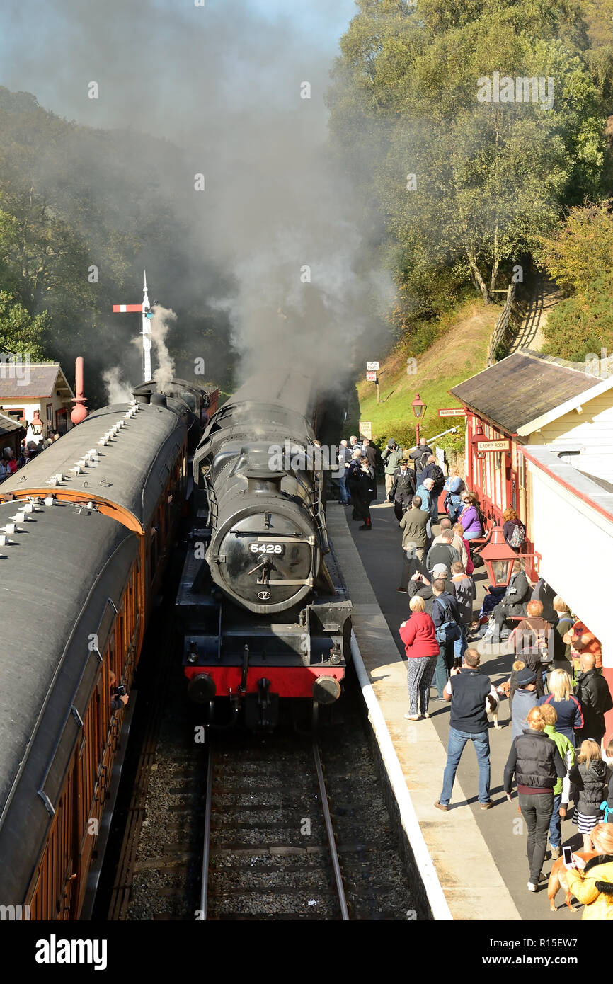 Steam train arriving at Goathland station during a busy gala weekend on the North Yorkshire Moors Railway, 29th September 2018. Stock Photo