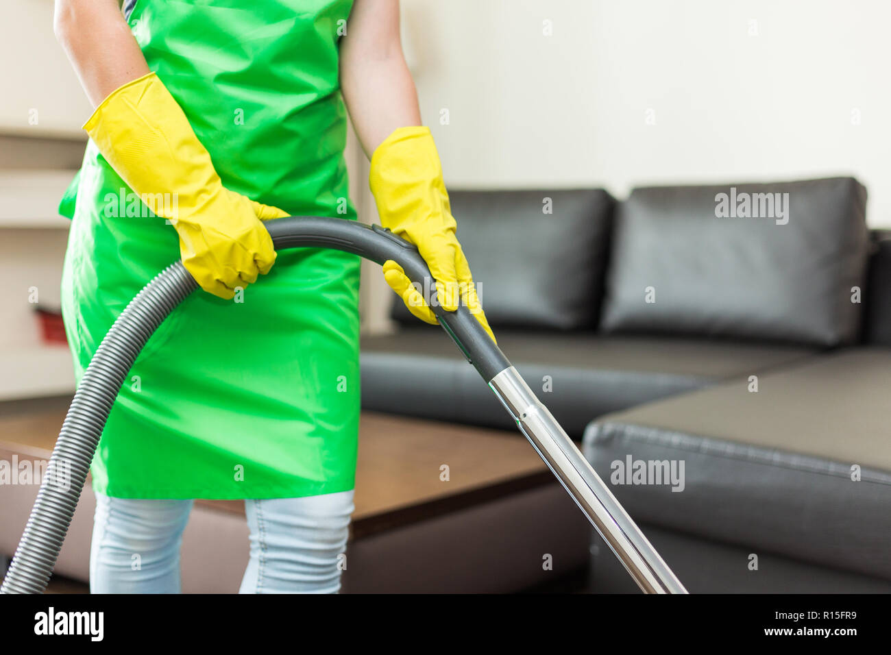 cleaning service. dust removal with vacuum cleaner. clean floor at home