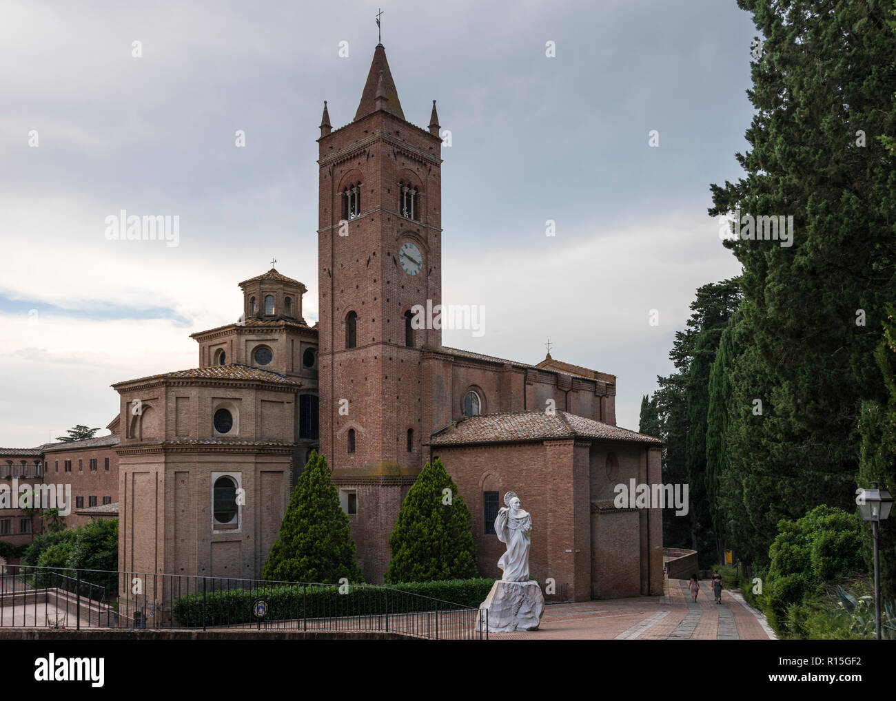 Saint Bernardo Tolomei Statue and The Abbey of Monte Oliveto Maggiore (Benedictine monastery), Tuscany, Italy Stock Photo