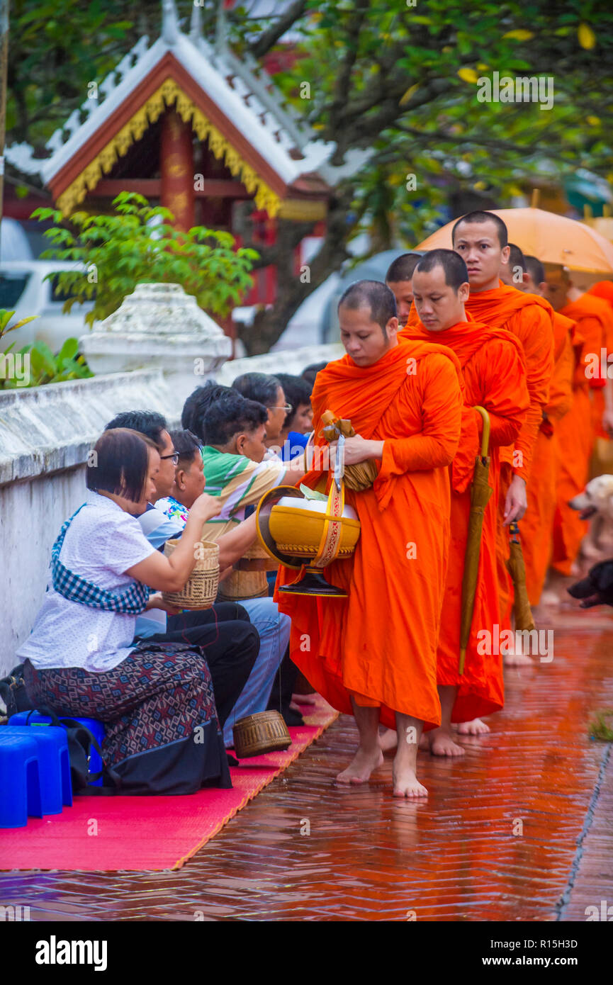 Buddhist alms giving ceremony in Luang Prabang Laos Stock Photo