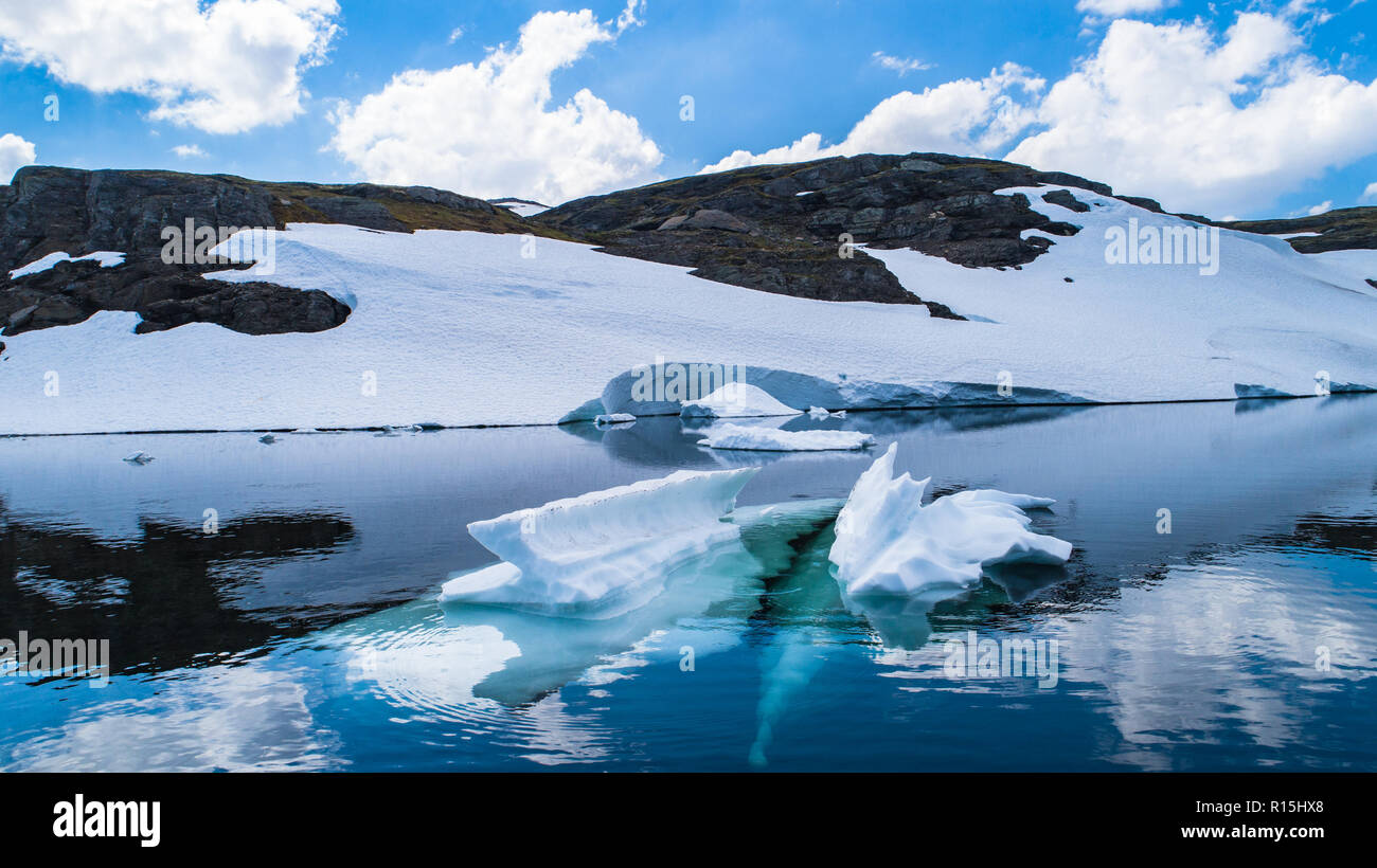 Melting ice in mountain lake. Norway. Stock Photo