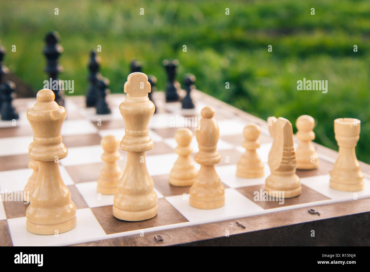 Chess Game in the Open Air with Wooden Chess with Parts of the