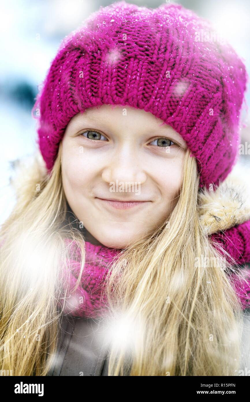 winter - little smiling girl outdoors at the snowfall time Stock Photo ...