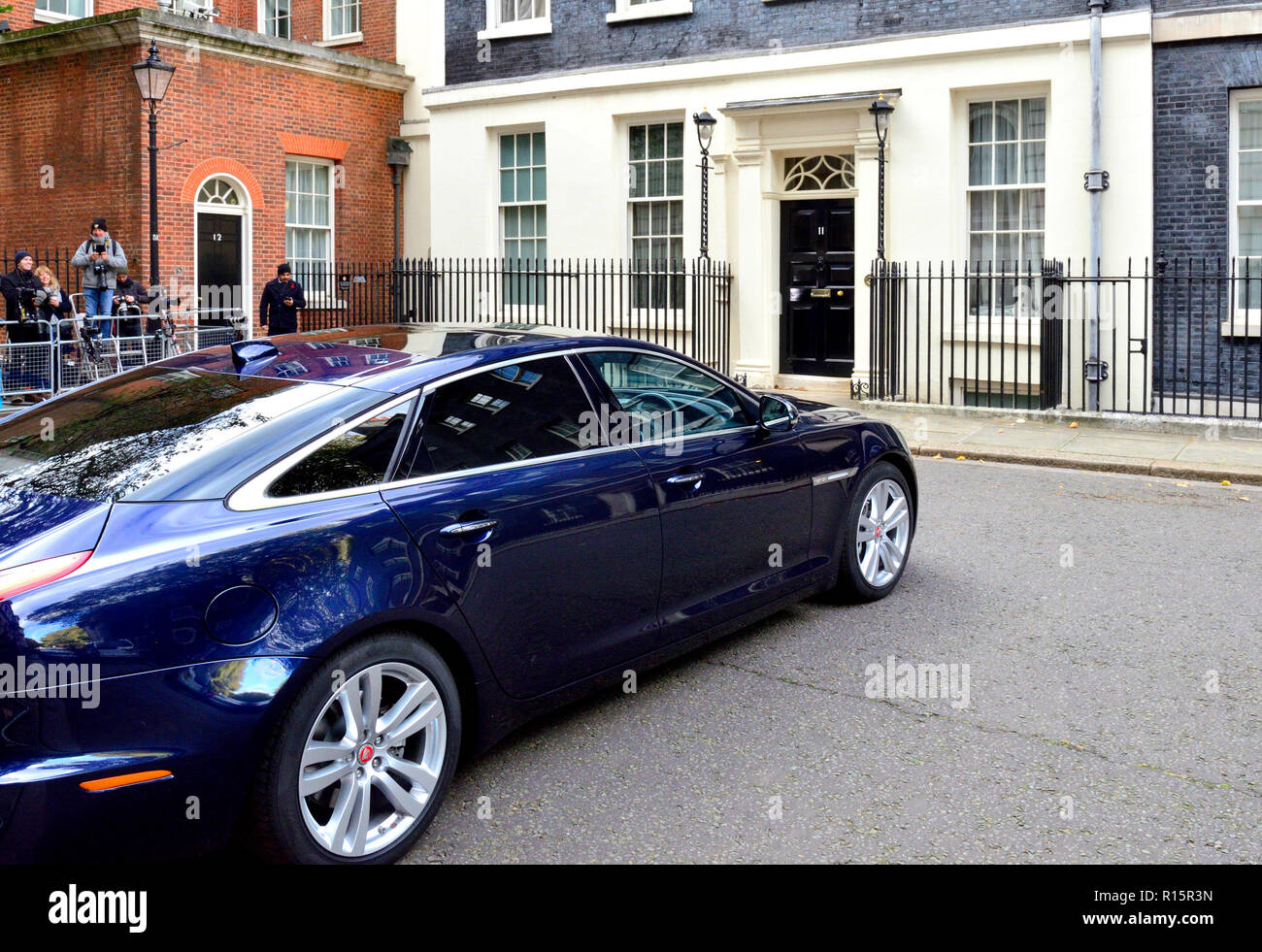 Ministerial car parked outside 11 Downing Street, London, England, UK. Waiting photographers (Budget Day) Stock Photo