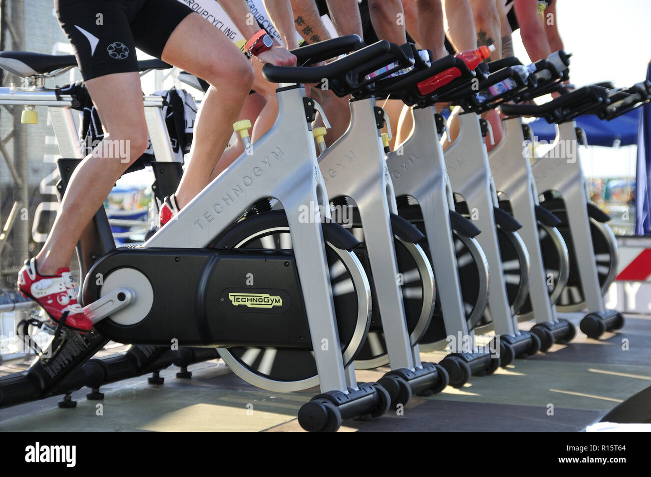 Cropped shot of spinning bikes. People working out on spinning bikes. Stock Photo