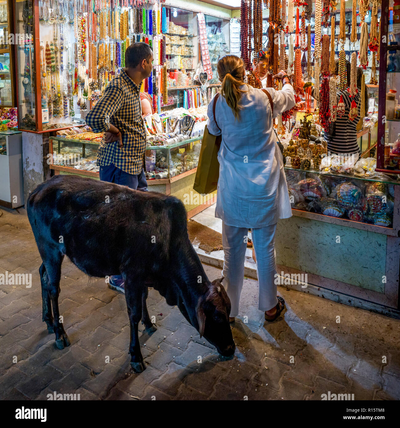 Tourists shopping at a souvenir shop, Rishikesh, Dehradun District