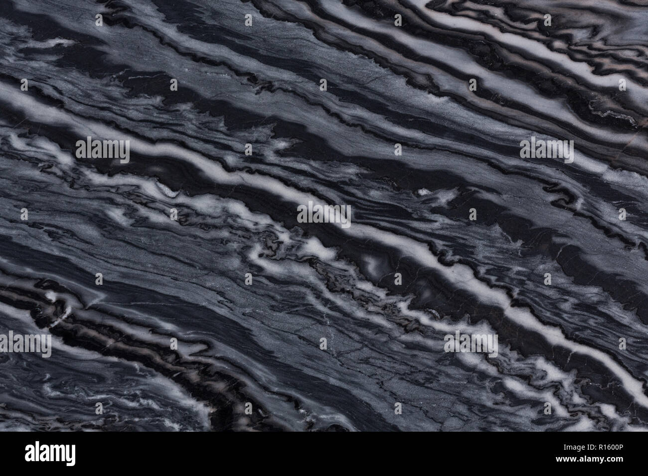 Contrast natural quartzite texture with exquisite ornamental surface in dark hue. Stock Photo